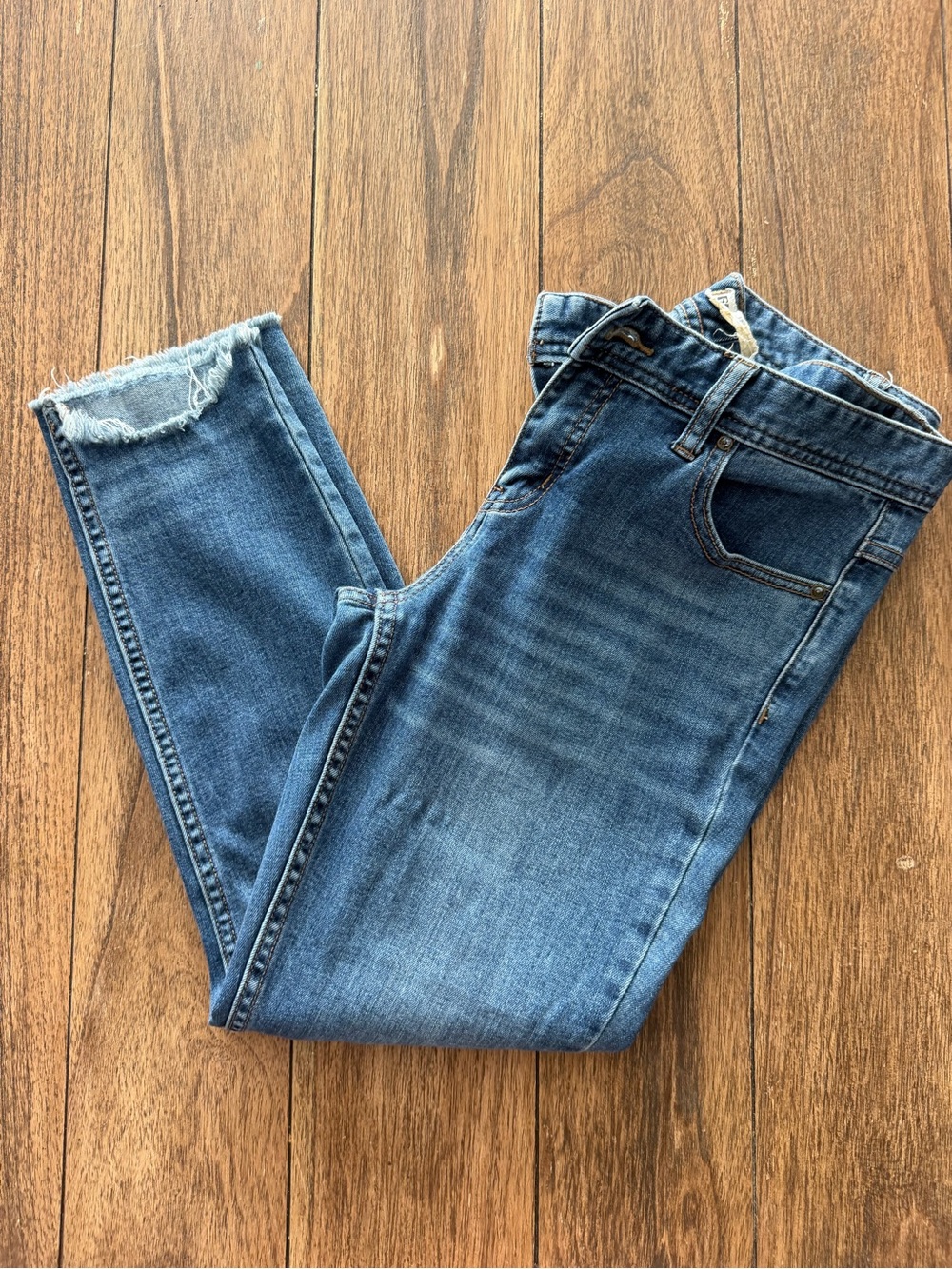 Free People Mid-Blue Denim Jeans with Frayed Hem